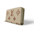 Load image into Gallery viewer, PRE-OWNED LOUIS VUITTON ZIPPY WALLET EMPREINTE