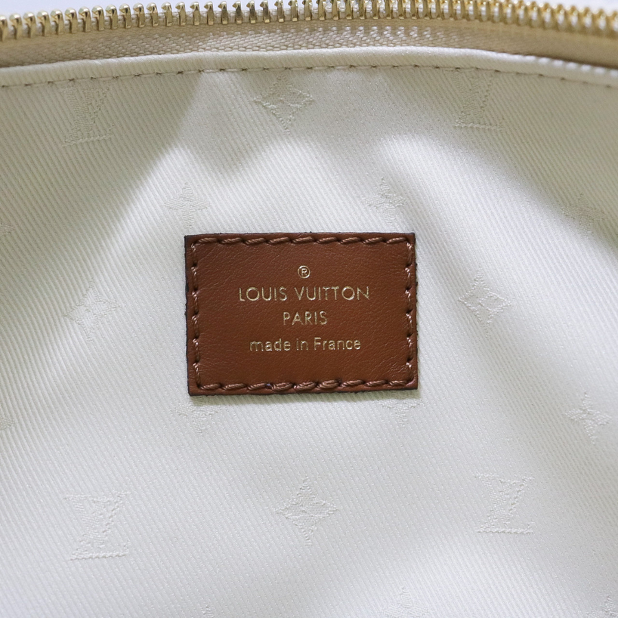 PREOWNED LOUIS VUITTON SKI OVER THE MOON