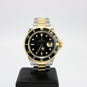 ROLEX SUBMARINER STAINLESS STEEL AND YELLOW GOLD