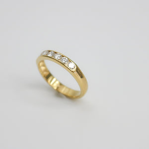 YELLOW GOLD CHANNEL SET WEDDING RING
