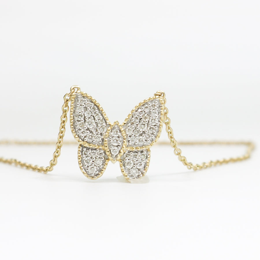 YELLOW GOLD DIAMOND BUTTERFLY PENDANT WITH NECKLACE.