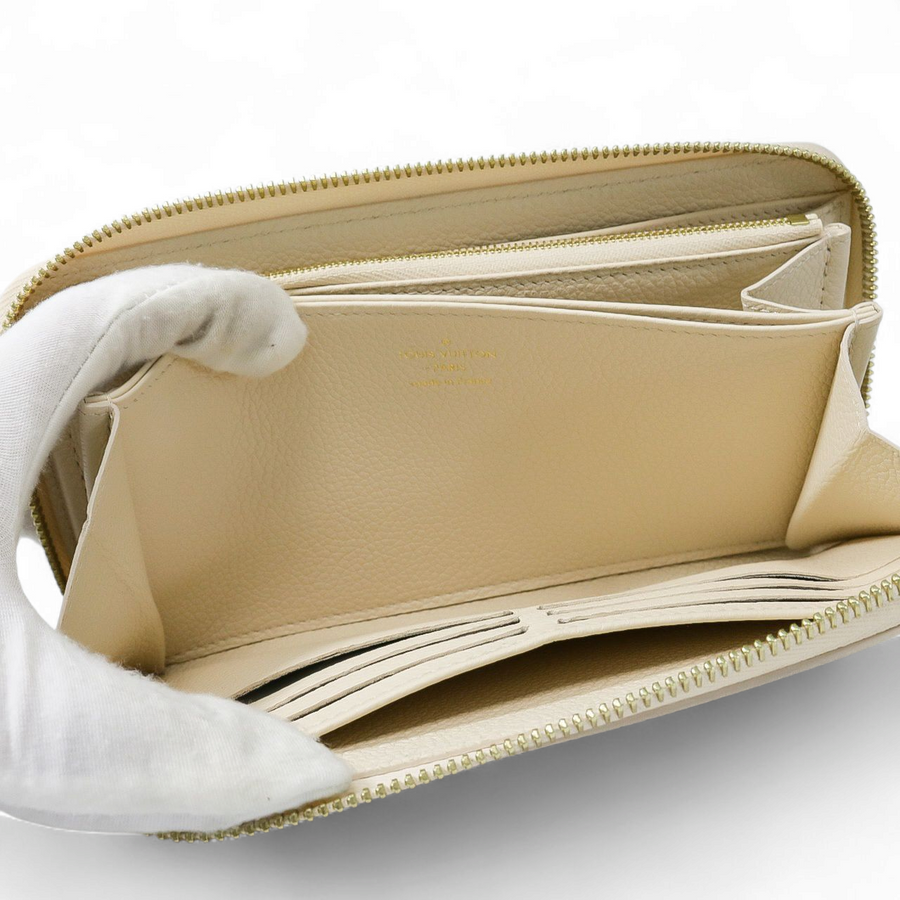 PRE-OWNED LOUIS VUITTON ZIPPY WALLET EMPREINTE