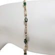 Load image into Gallery viewer, YELLOW GOLD ARTICULATED LINK BRACELET WITH EMERALD GEMSTONES
