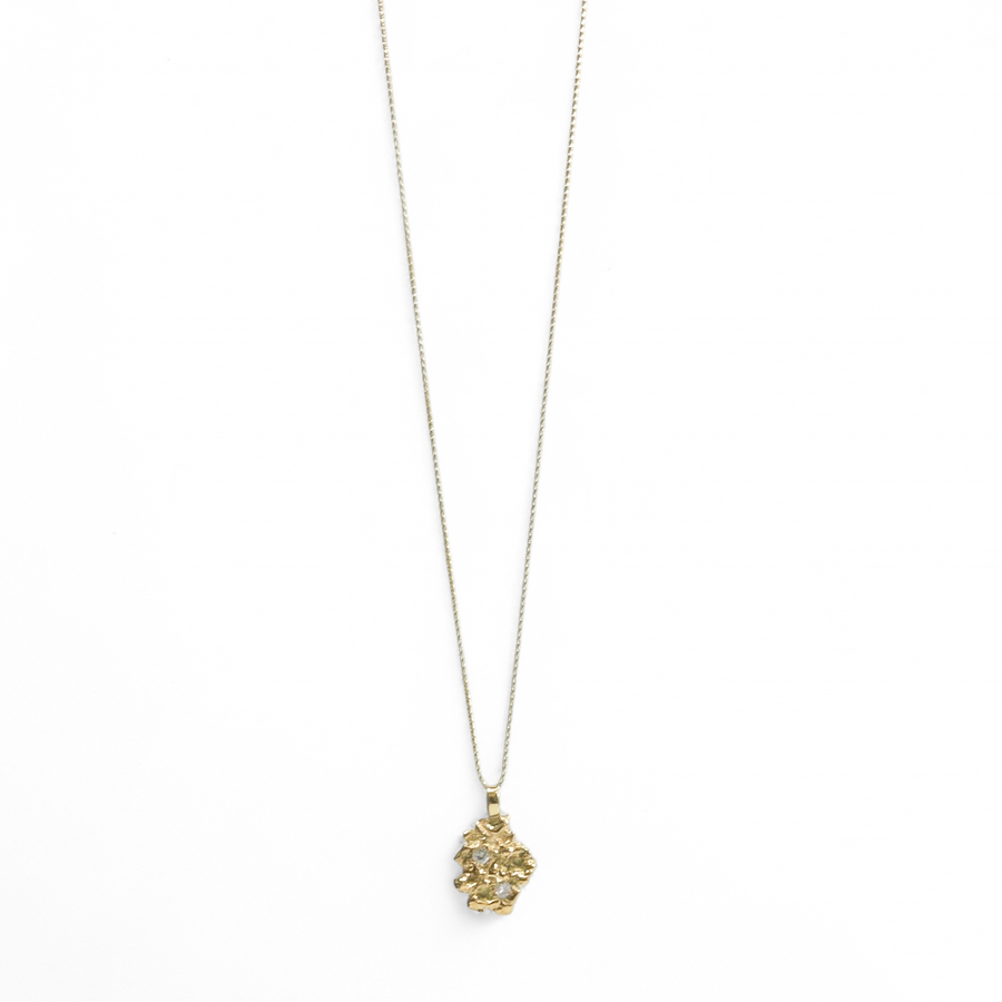 YELLOW GOLD NUGGET PENDANT WITH NATURAL DIAMONDS.